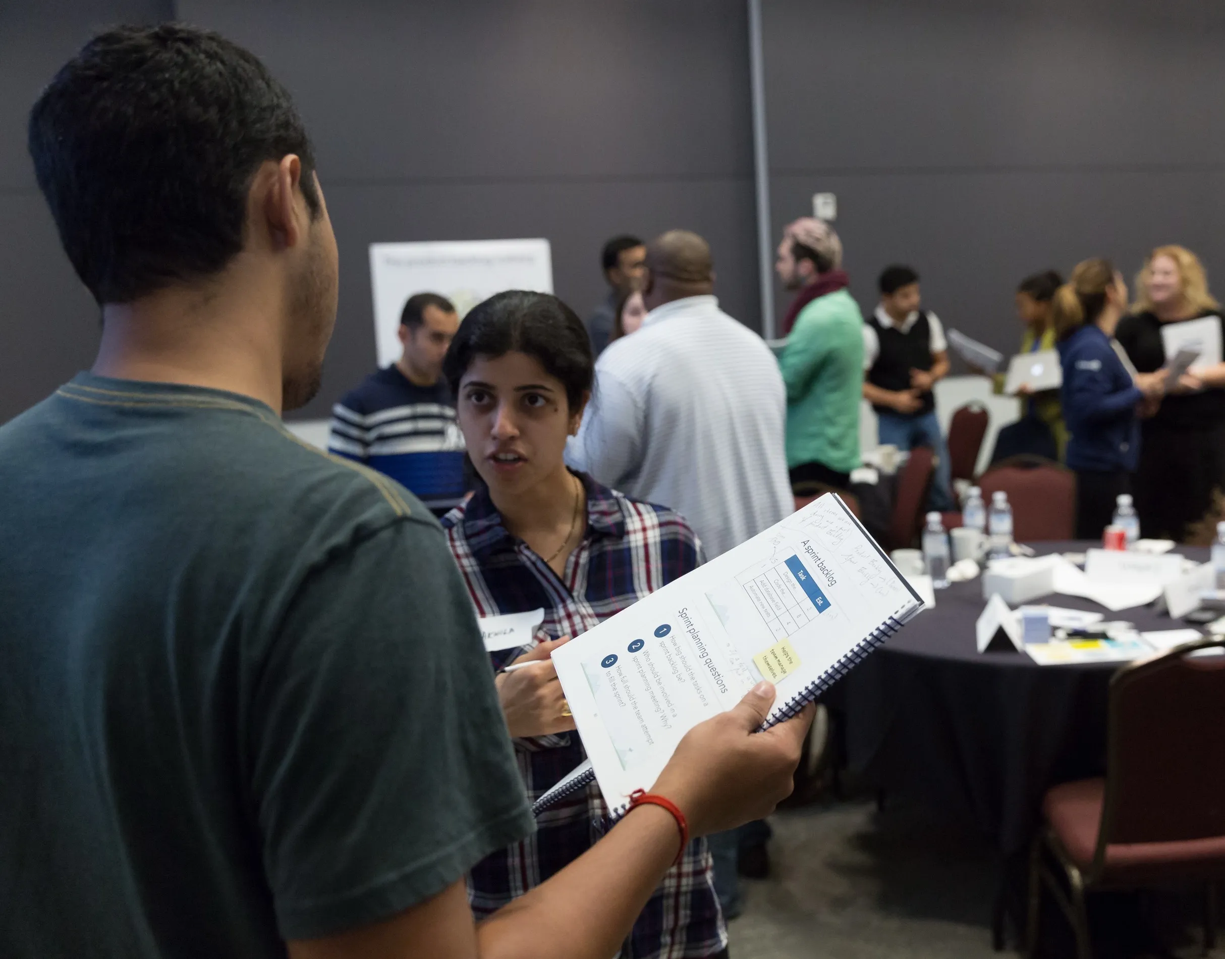 Participants working through a collaborative workshop conversation